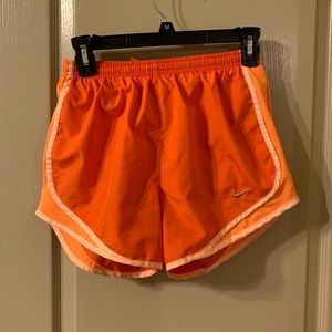 Small dri-fit orange Nike women’s shorts